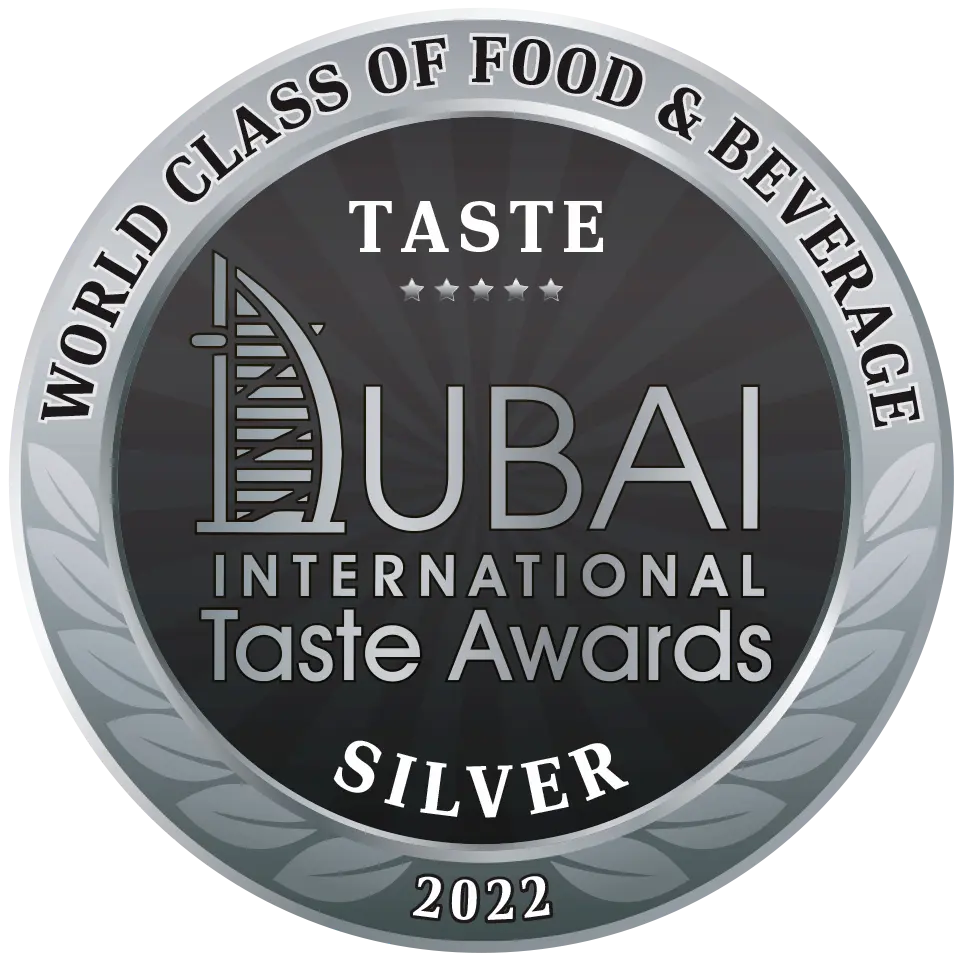 A képen a "World Class of Food & Beverage" verseny ezüst díjának címere található.