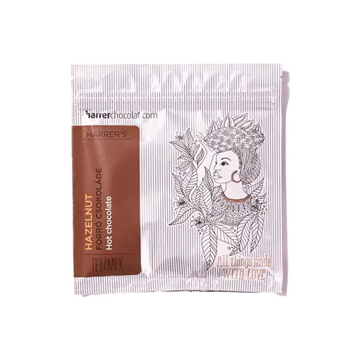 Harrer mogyorós forrócsoki van a képen, fehér csomagolásban. 