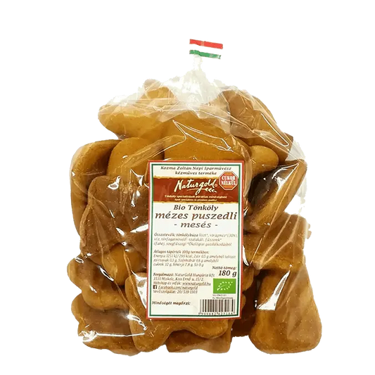 Naturgold mézes puszedilik átlátszó csomagolásban, fehér háttérrel. 