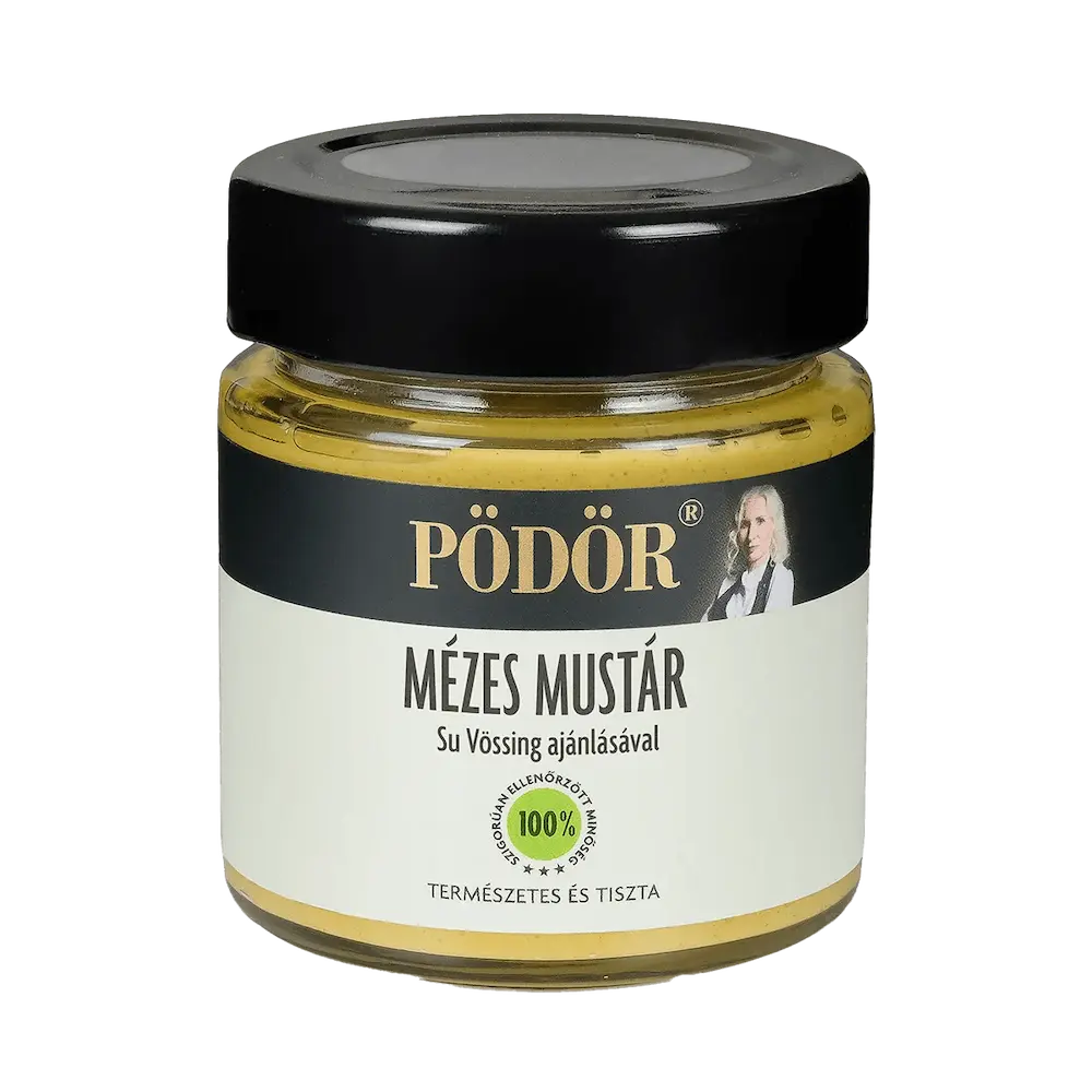 Pödör mézes-mustár látható a képen, az üvegen keresztül látszik a mustár, amely gyönyőrű színú. A címke fehér és fekete színű, a "Mézes mustár" felirat fekete színű. 